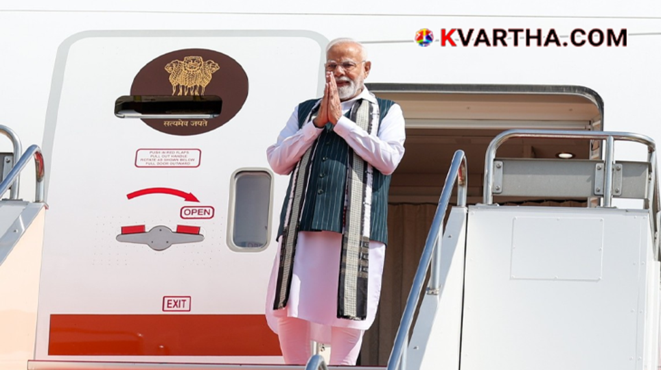 Prime Minister Narendra Modi waving before boarding his flight for a foreign tour.