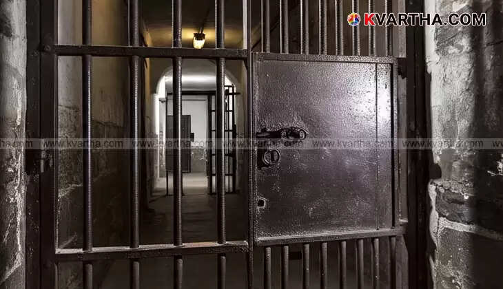 Saravanan, accused in a murder case, being escorted by police after his arrest.