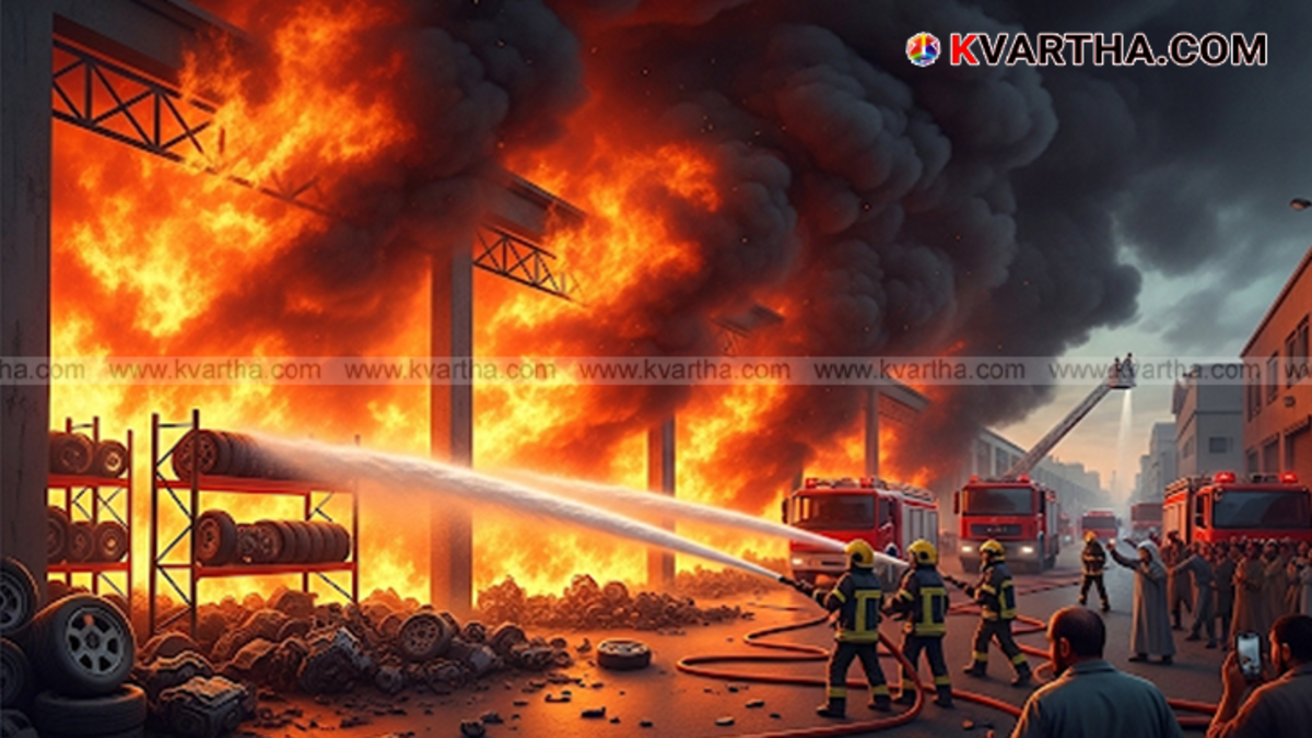 Fire and thick black smoke rising from an auto spare parts warehouse in Sharjah Industrial Area.