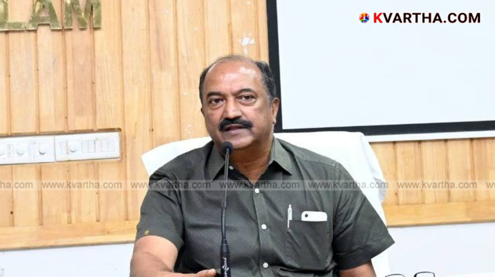  Hand holding a bunch of money with Onam decorations in the background.