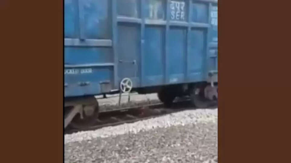 Women escapes unhurt after train passes over her body; video goes viral,&nbsp;train accident, woman rescued.