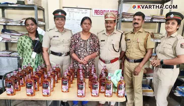 Seized liquor bottles from Puducherry in Thalassery.