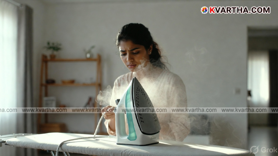A close-up of a burnt and dirty electric iron soleplate showing carbon buildup.