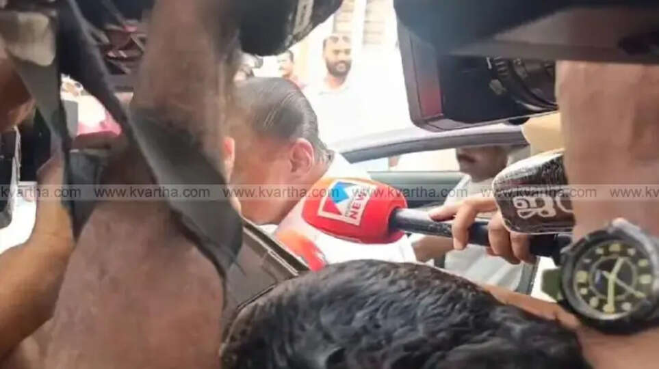 MV Govindan, CPI(M) state secretary, avoiding media questions about PV Anwar allegations.