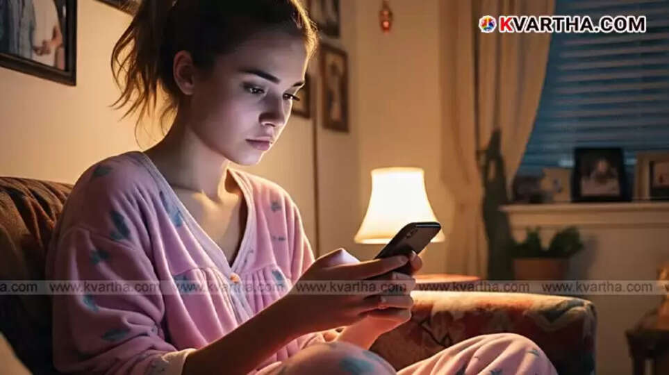 A person using a mobile phone late at night, highlighting the connection between mobile use, sleep deprivation, and liver health.