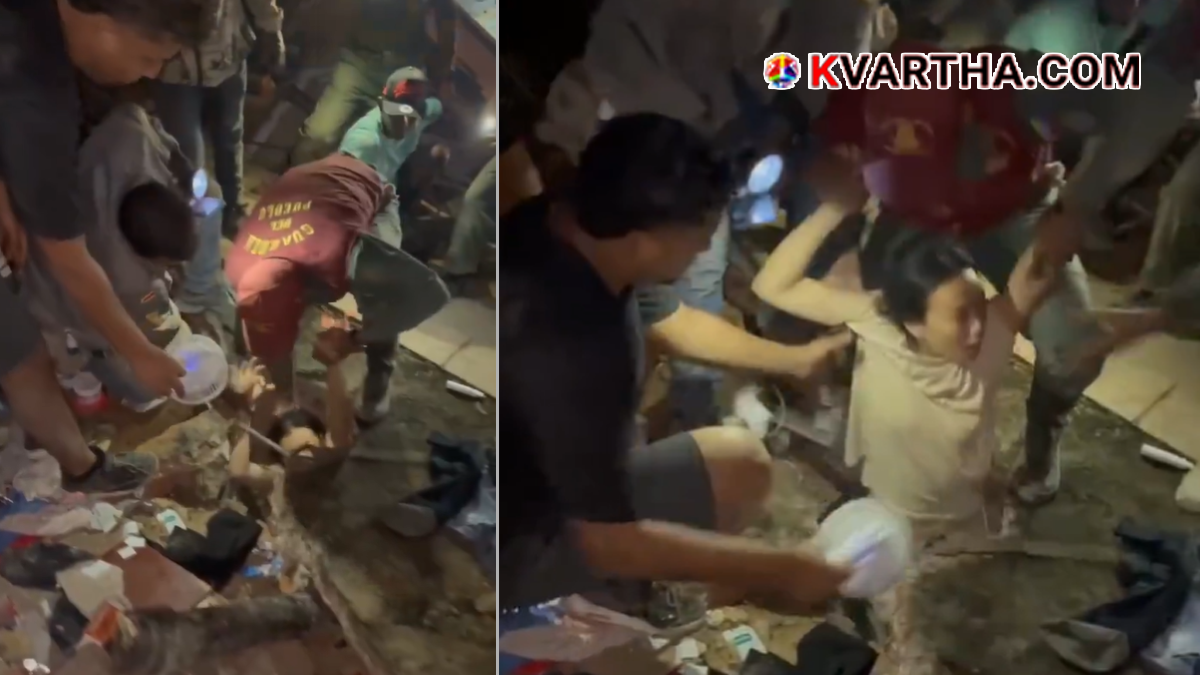 Rescuers clearing building rubble in Venezuela
