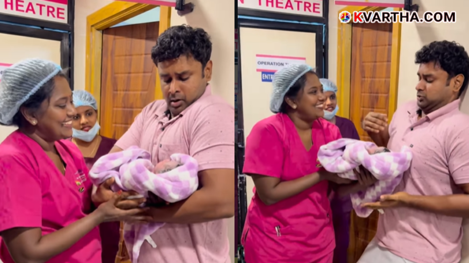 Close up of a father's trembling hands supporting a newborn baby wrapped in a cloth