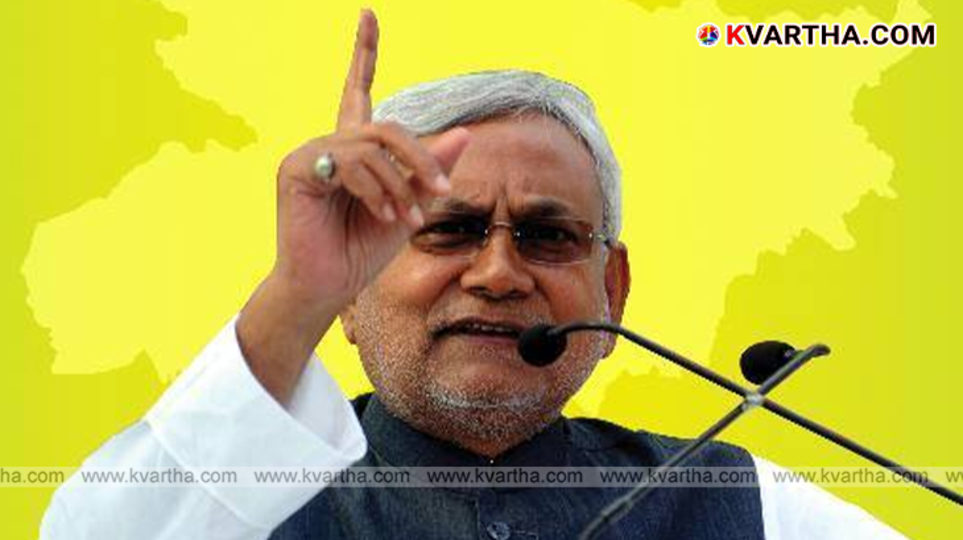  Nitish Kumar waving after an election victory.