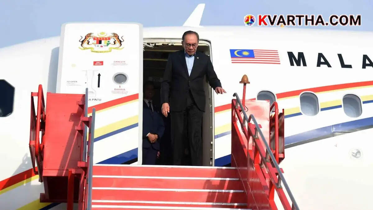 Image reflecting Malaysian Prime Minister Anwar Ibrahim's visit to Markaz in Kozhikode