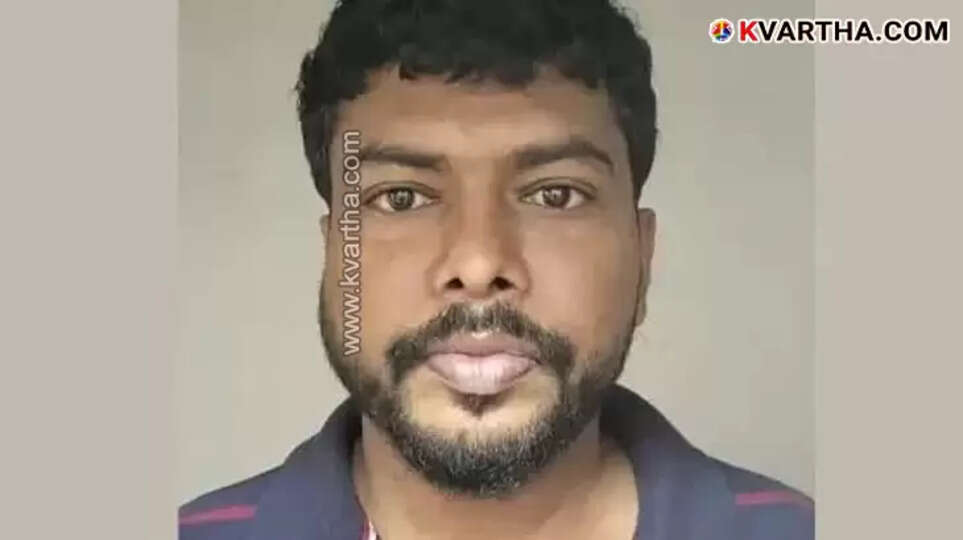Kochi police arresting a man involved in job fraud scam