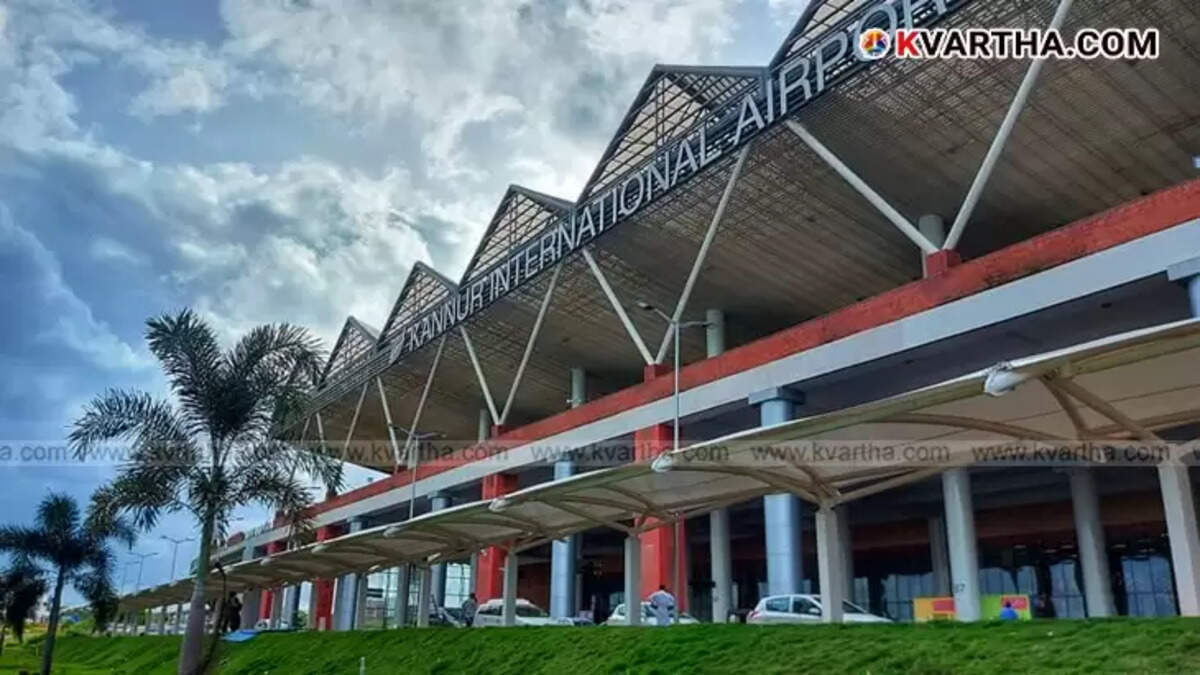 Kannur International Airport terminal building with an aircraft on the tarmac.