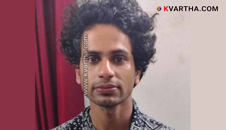 Kerala police arresting a youth for drug smuggling.