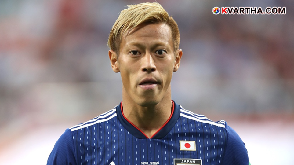 Keisuke Honda speaking at a football event regarding the 2026 World Cup